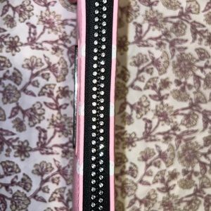 Like new Playboy pink wallet. Zipper works great.